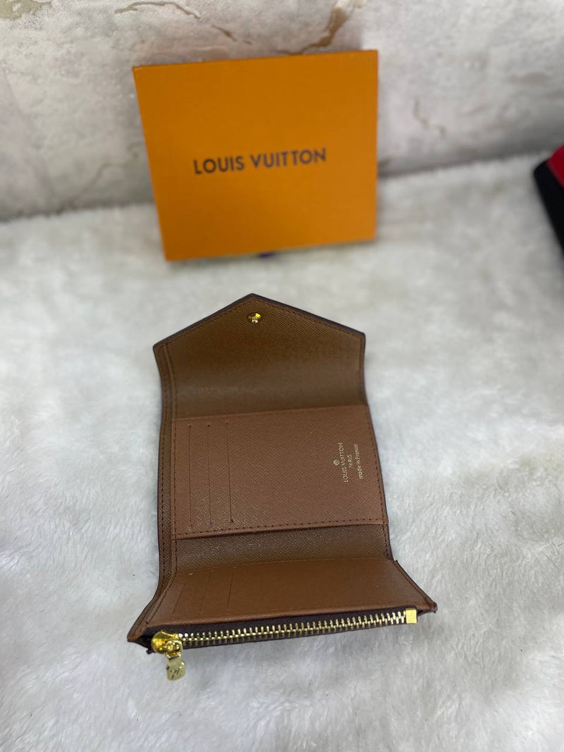 Port monnaie LV marron 2