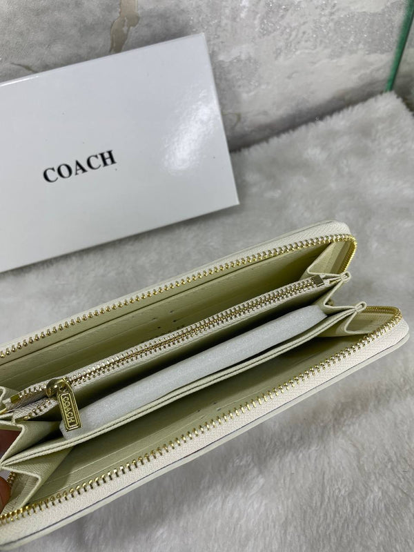 Port monnaie COACH grand beige